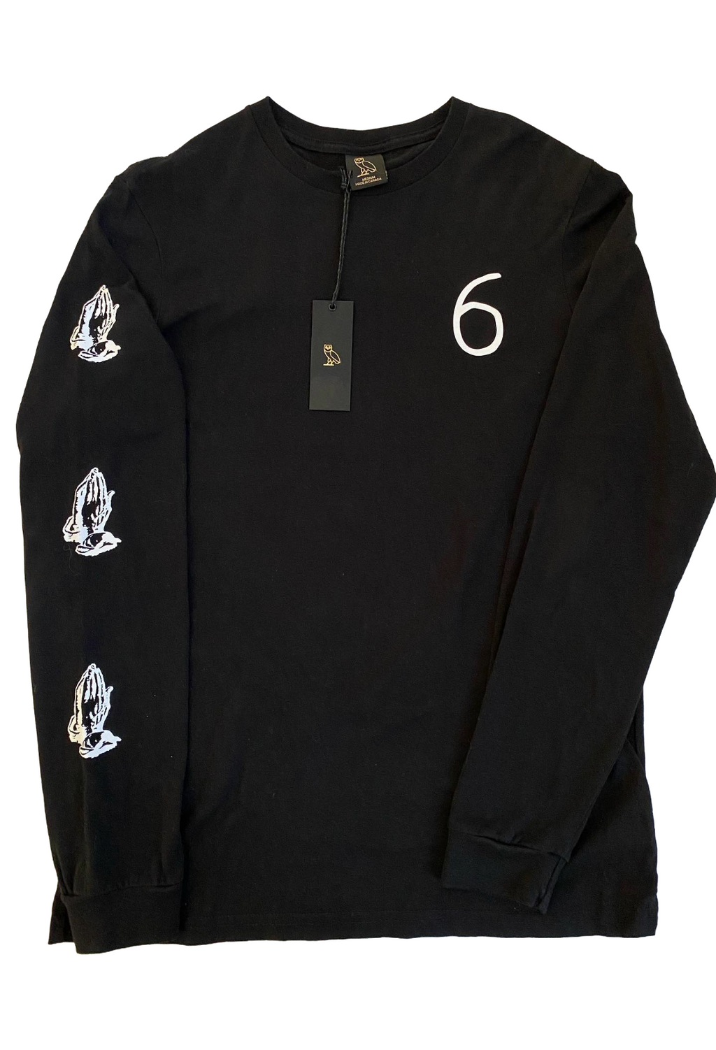 Black long-sleeve shirt with white graphics on a white background OVO 6 God Longsleeve Shirt