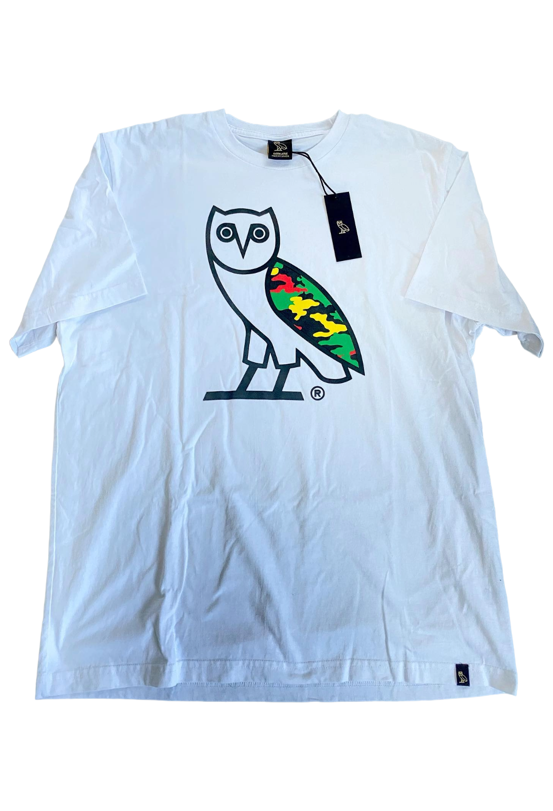 White t-shirt with colorful owl graphic and tag on a white background OVO OG Owl Camo Tee