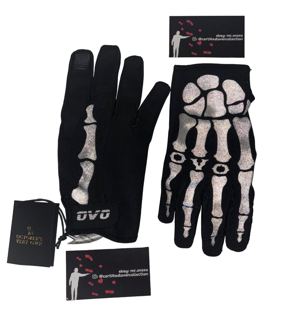 Black gloves with skeleton design on a white background