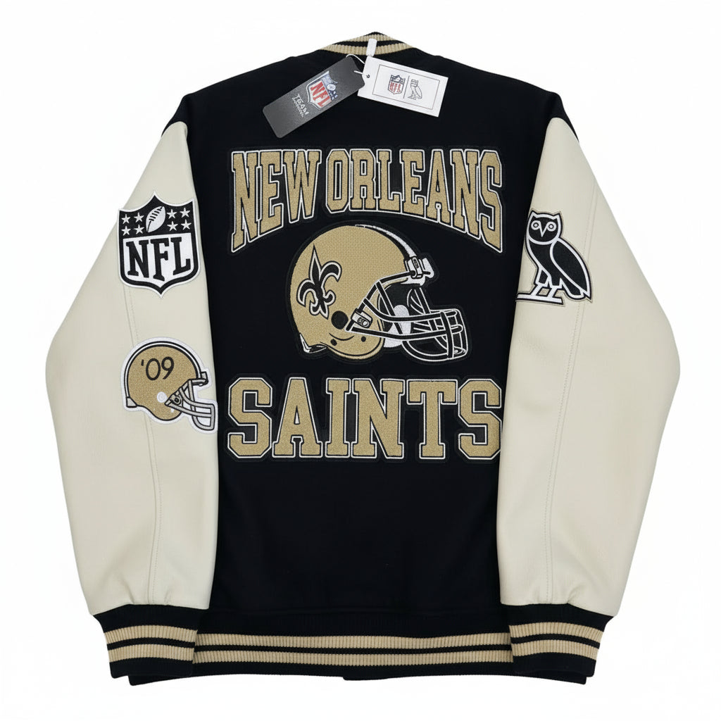 Black and white jacket with New Orleans Saints logo and NFL branding on a white background