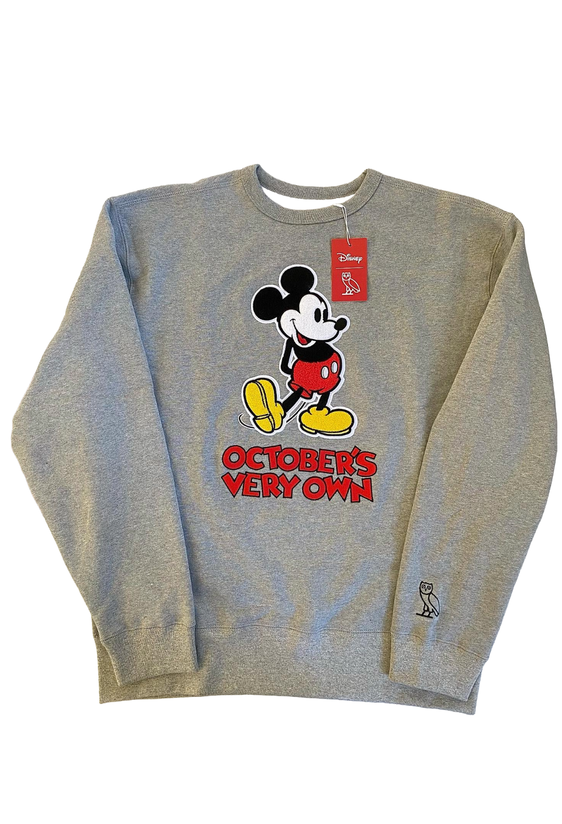 Gray sweatshirt with a cartoon character and 'October's Very Own' text on a white background OVO x Disney Classic Mickey Crewneck