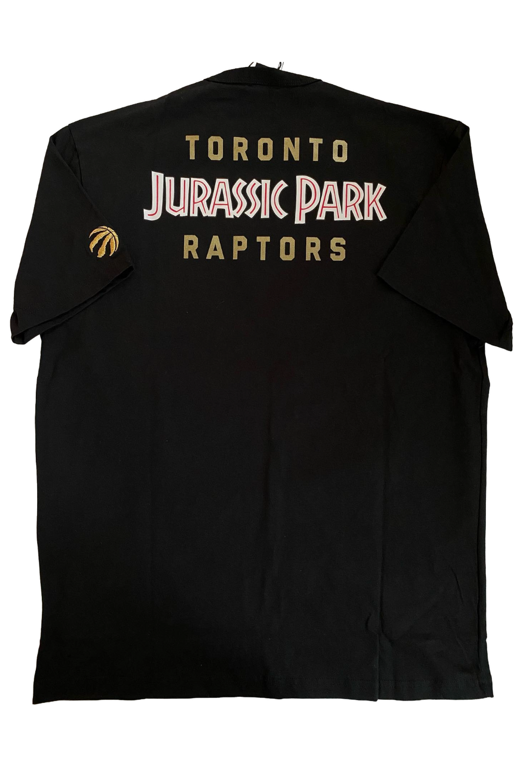 Black vest with 'Toronto Jurassic Park Raptors' text on the back. OVO x Jurassic Park x Raptors