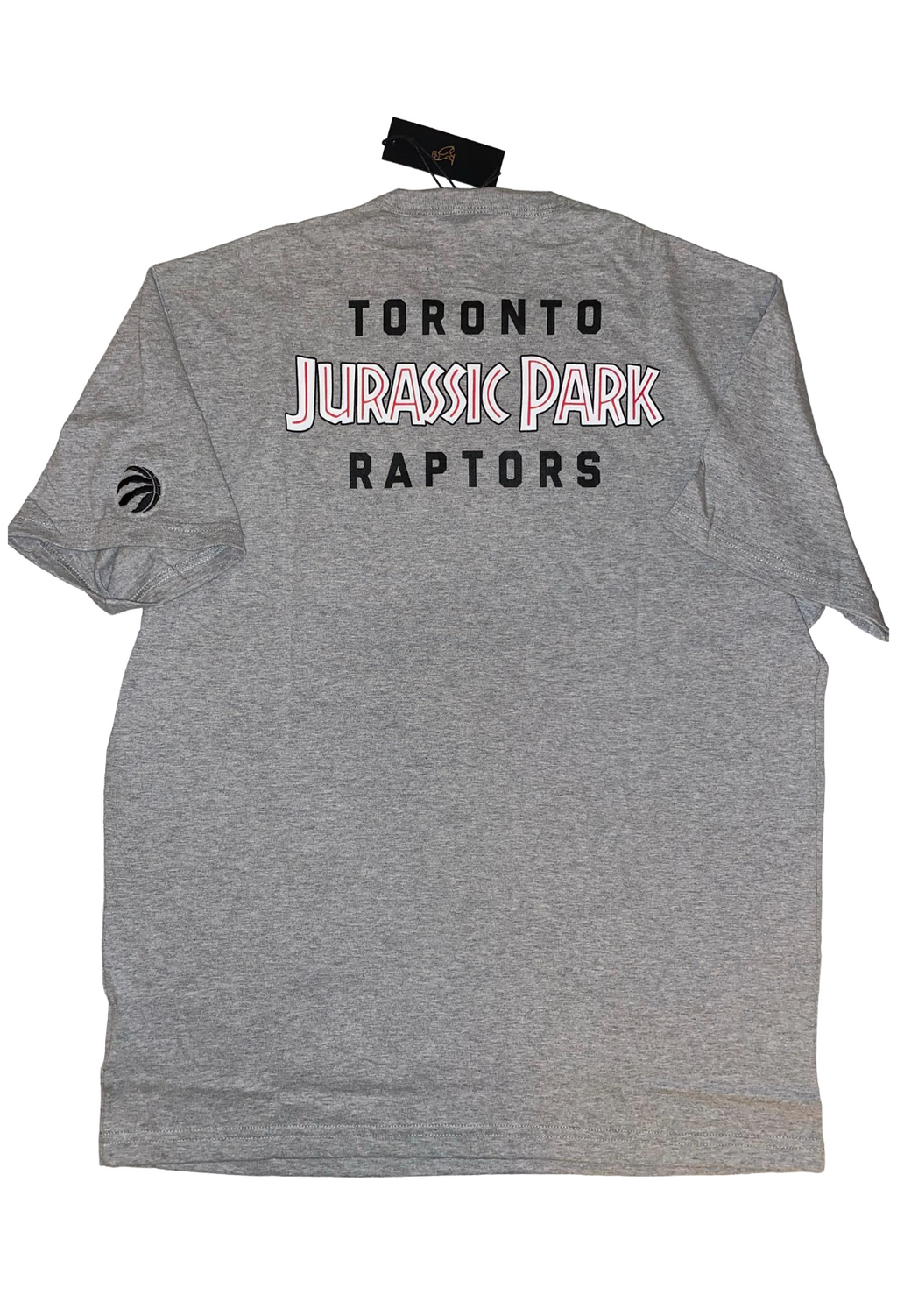 Gray t-shirt with 'Toronto Jurassic Park Raptors' text on the back, displayed against a white background.