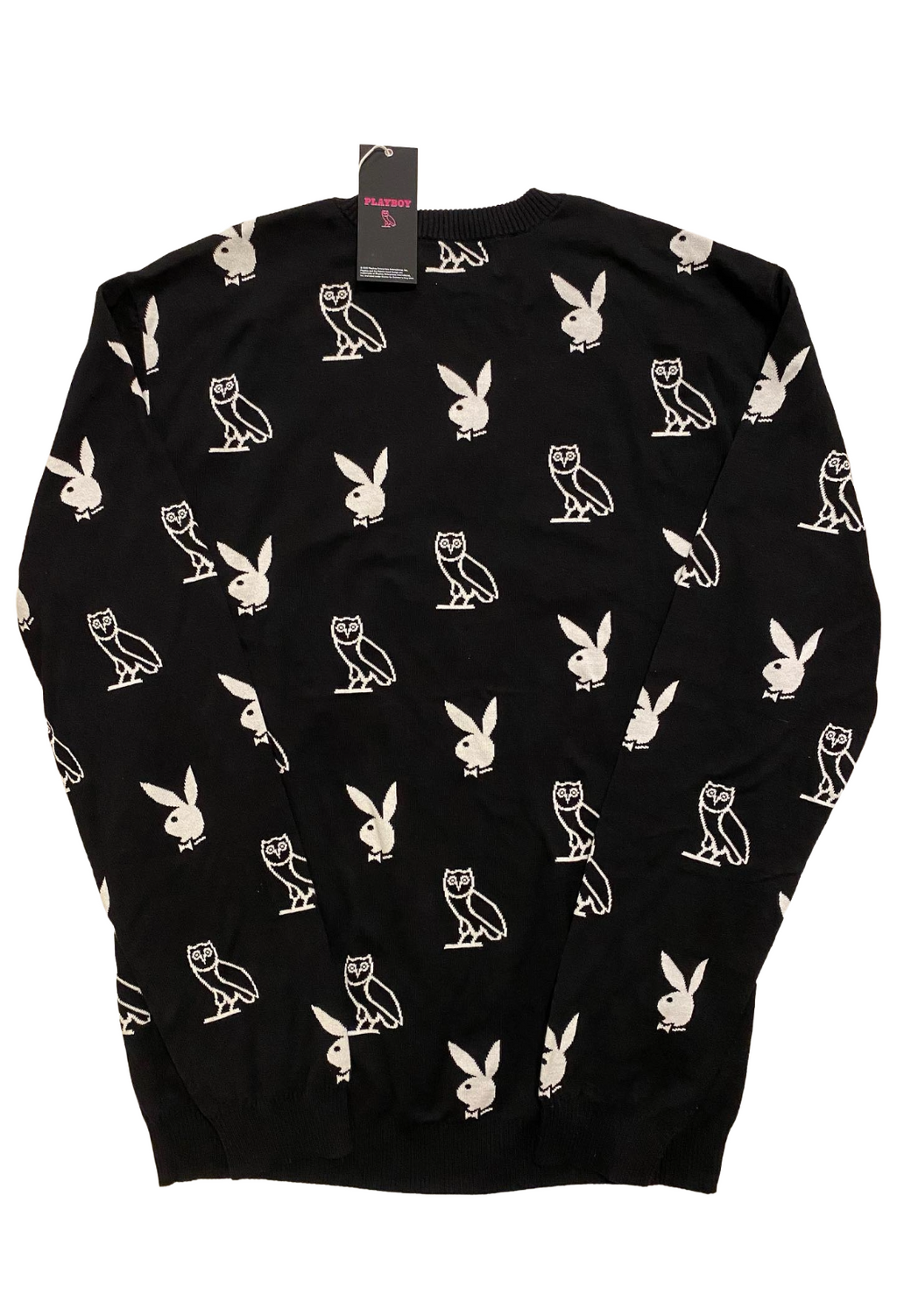 Black sweater with white graphic patterns on a white background OVO x Playboy Intarsia Monogram Sweater