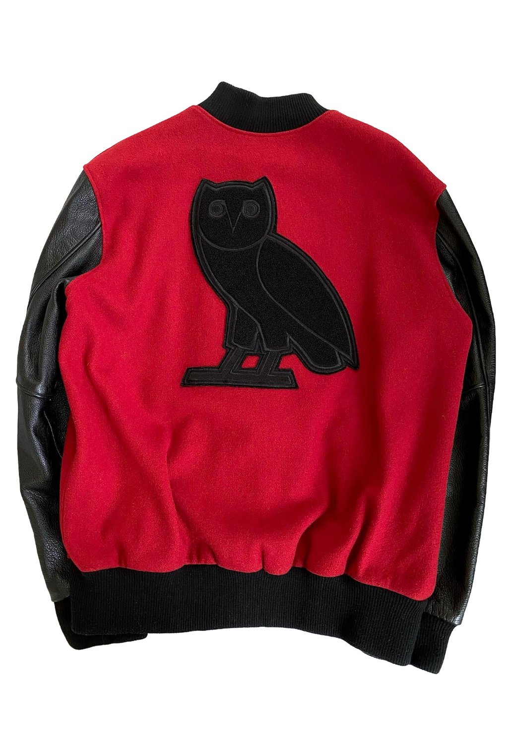 Red jacket with black owl logo on a white background OVO x Roots Toronto Raptors Varsity Jacket Player Roster Exclusive