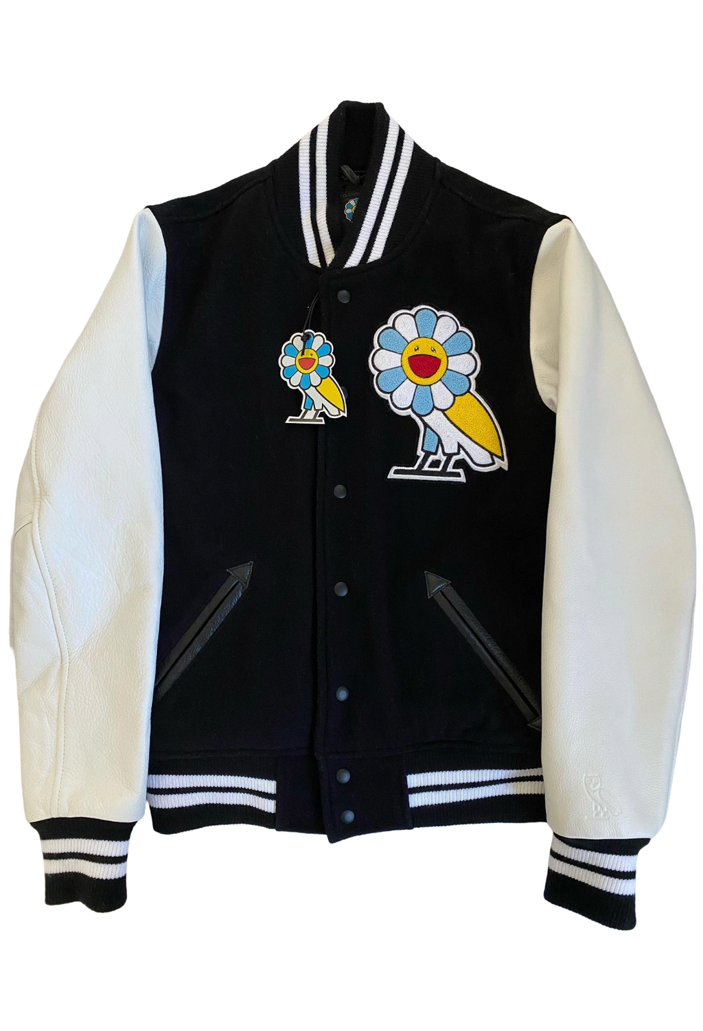 Black and white varsity jacket with colorful designs on a white background OVO x Takashi Murakami Leather Wool Varsity Jacket